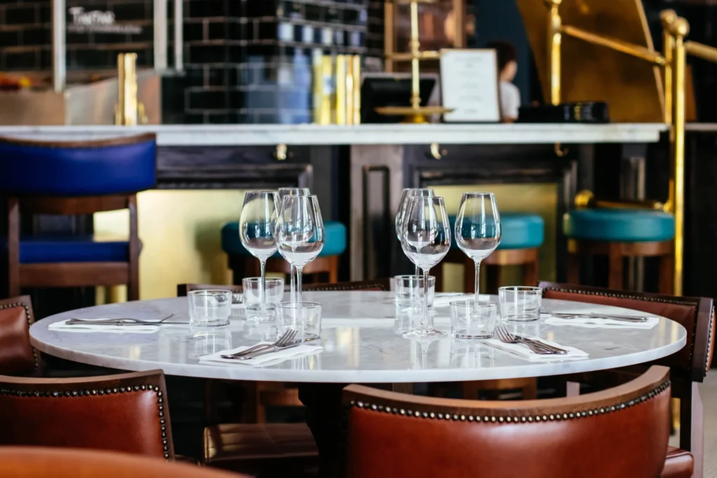 a table in a restaurant prepared for a happy hour interview